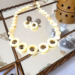 Statement artisan mother-of-pearl necklace and earrings set.